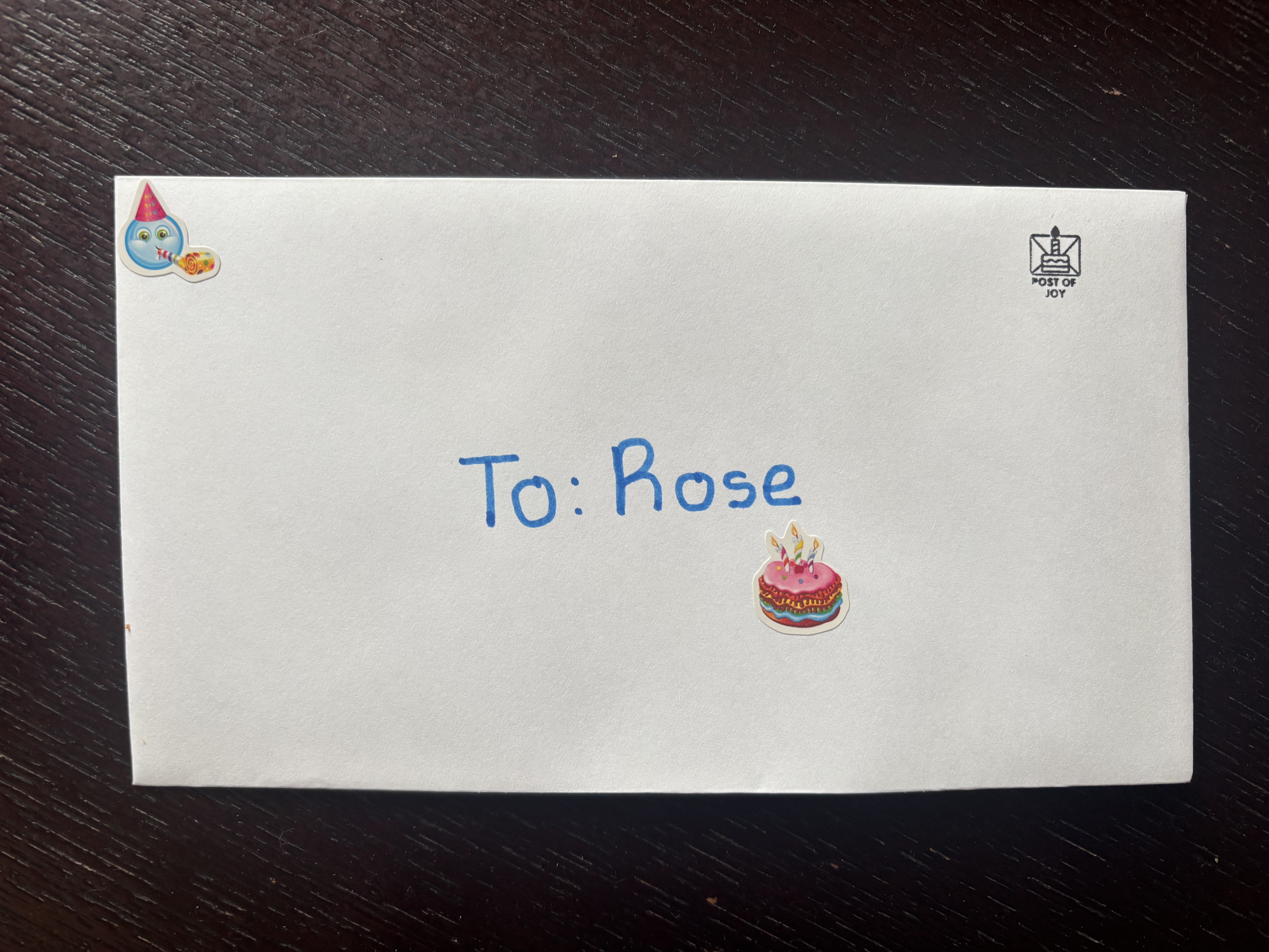 A decorated birthday letter with Post of Joy branding.